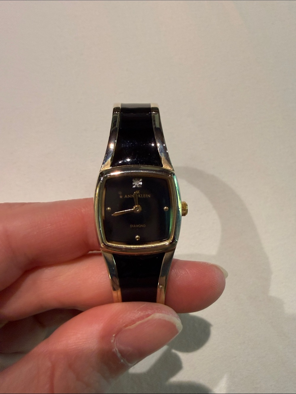 Anne Klein Gold Tone Watch with Black Bracelet